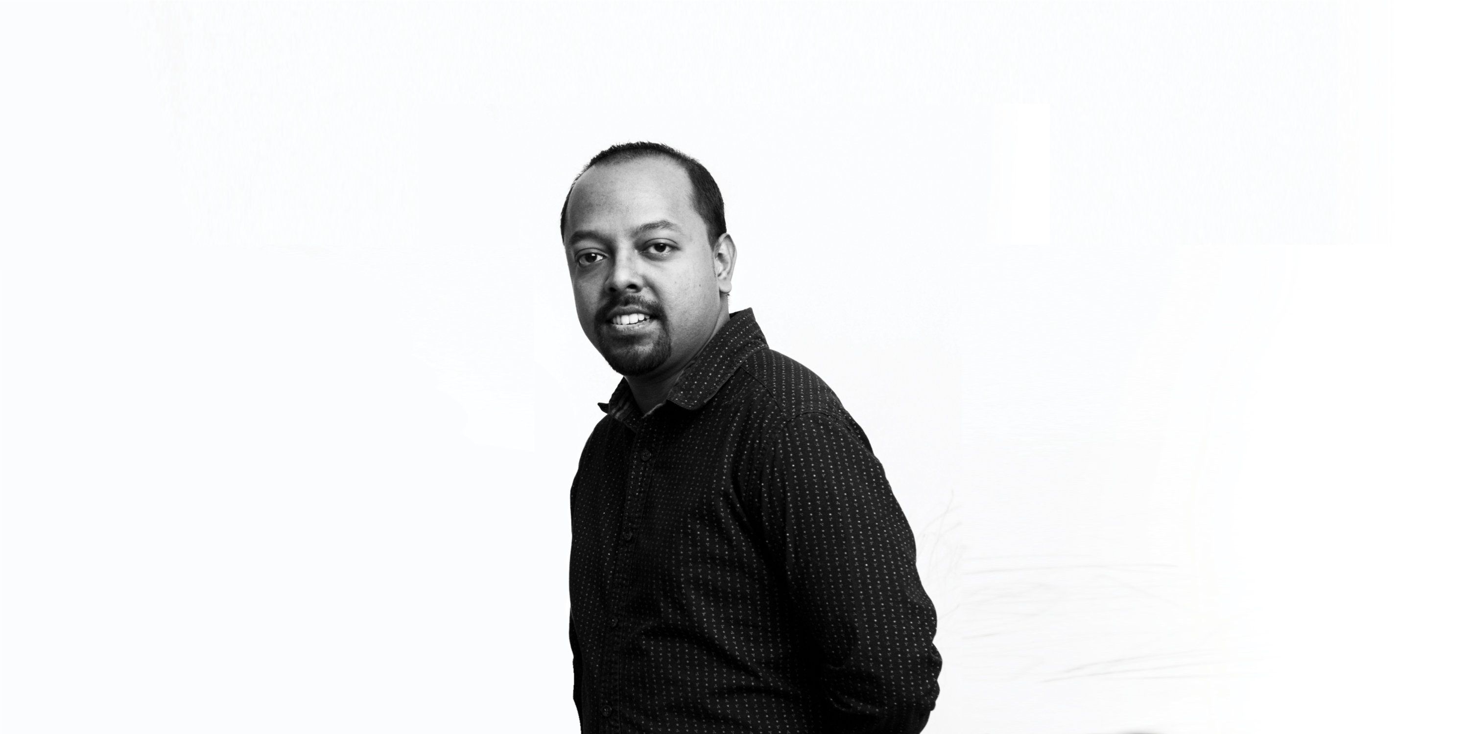 Bijoy Thangaraj playing guitar